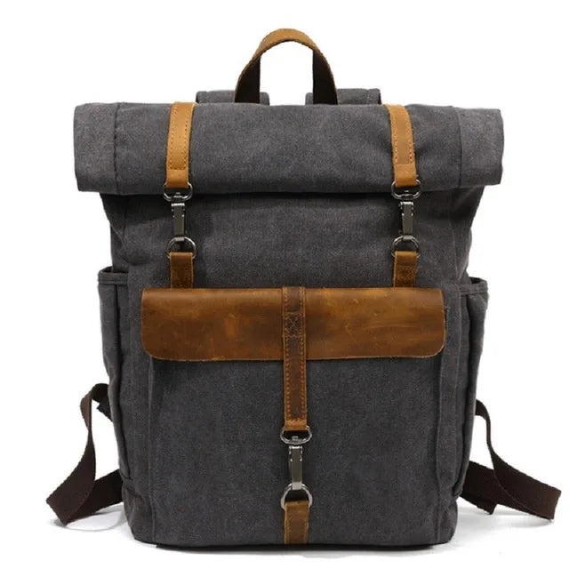 Vintage waxed canvas travel backpack dark green