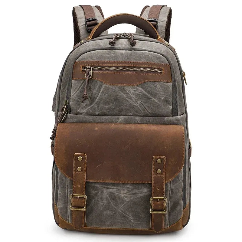 Waxed canvas and leather camera backpack dark grey