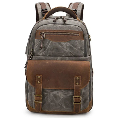 Waxed canvas and leather camera backpack dark grey
