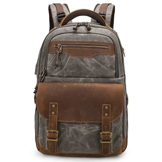 Waxed canvas and leather camera backpack dark grey